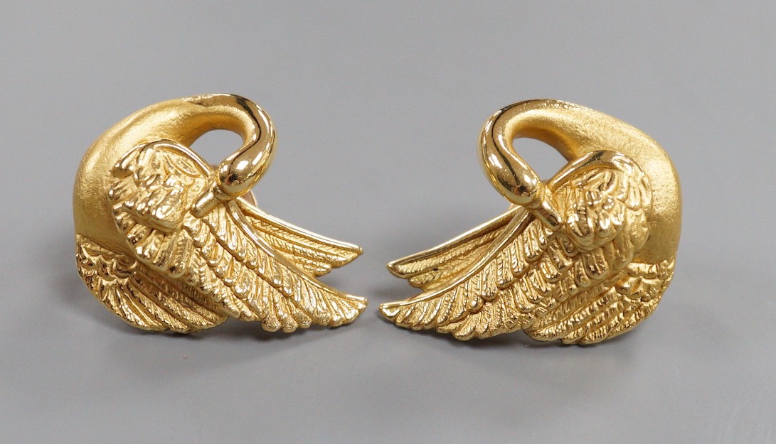A modern pair of hollow 750 yellow metal earrings, modelled as swans, 26mm, gross weight 7.4 grams.